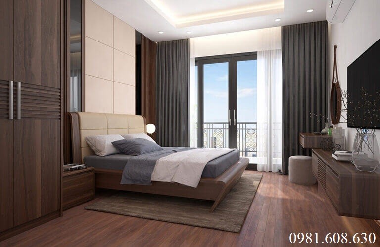 Phòng ngủ được thiết kế dùng nhiều đồ nội thất làm từ gỗ óc chó nhưng vẫn tạo sự thoải mái nhờ cách bố trí hài hòa
